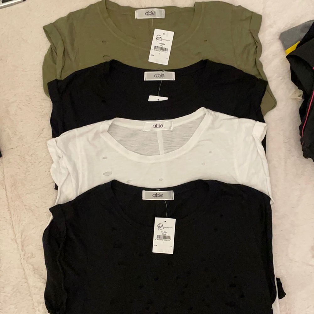 Lot of 4 distressed shirts from Bloomies large
